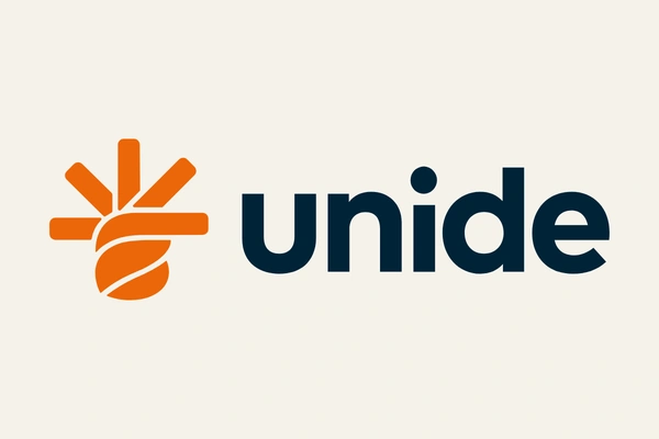 Logotipo oficial de Unide Supermercados, cadena del local de Primero de Mayo 100 en Vecindario